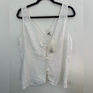 White sleeveless blouse by A New Day with front ties, size L.